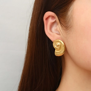 French style 18k gold plated stainless steel seashell spiral earring on model