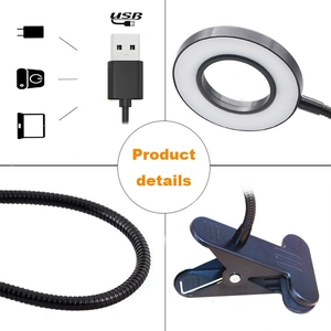 LED ring light detail showing USB power, flexible neck, and strong spring clamp base