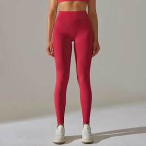 Detailed texture of seamless high-waist yoga pants with supportive tummy control waistband