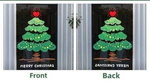 Close-up of double-sided Christmas tree window sticker showing front and back views