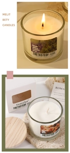 Detail of glass scented candles with wooden lids and elegant window gift box packaging