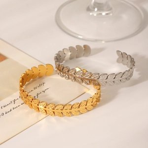 Leaf-shaped stainless steel open bangles in gold and silver finish for women