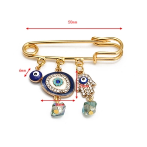 Detailed dimensions of Hamsa Hand and Evil Eye gold brooch with crystal charm