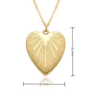 Detail of 18K gold plated heart pendant showing dimensions 25.7mm by 21.7mm on white background