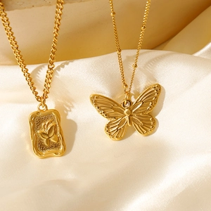 Retro 18K gold plated butterfly pendant necklace set on premium white silk background