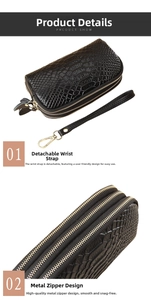 Detail of black embossed leather clutch with double zippers and detachable wrist strap