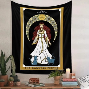 Bohemian Freyja goddess tarot tapestry hanging on wall with home decor and plants