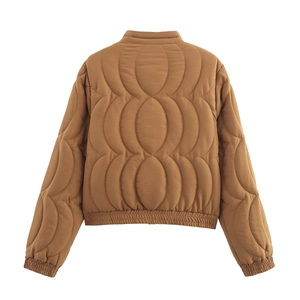Detailed back view of brown quilted bomber jacket with elastic cuffs and unique oval stitching