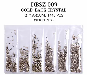 Macro shot of 1440pcs gold back crystal rhinestones in sorted plastic packaging case