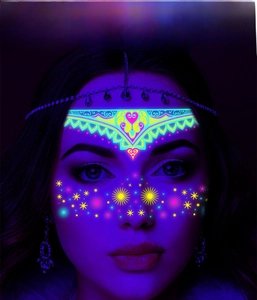 Detail of neon face tattoo sticker with glowing mandala and star patterns for festivals