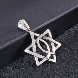 Detailed close-up of a silver hexagram and Ichthus fish symbol pendant in polished steel