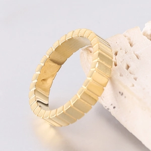 Macro shot of 4mm gold-plated stainless steel ring with geometric square facets