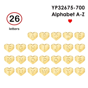 Golden heart-shaped stainless steel charms with 26 letters A-Z on a white background