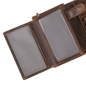 Detail of leather wallet interior featuring double ID windows and sturdy stitching