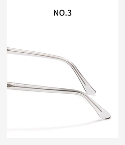 Close-up of transparent eyewear temples showing reinforced metal core and sleek finish