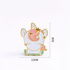 Detail view of unicorn enamel pin with 3cm height and 2.5cm width dimensions