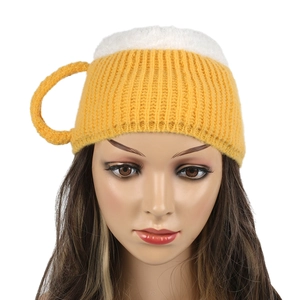 3D beer mug knitted hat featuring yellow body, white foam top and a small handle