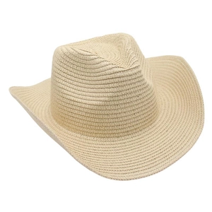 Close-up of woven straw cowboy hat with curved brim and structured crown in beige