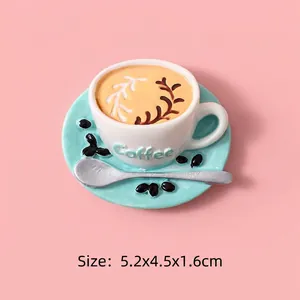Close-up of resin miniature coffee cup and saucer magnet measuring 5.2x4.5x1.6cm