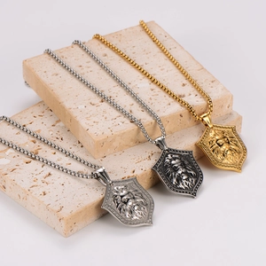Three punk stainless steel lion head shield necklaces in gold, silver and vintage finish