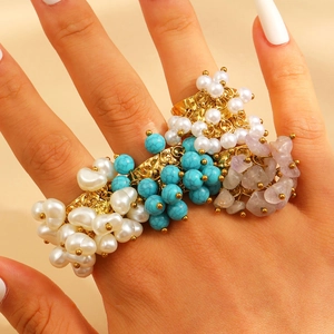 Bohemian style gold multi-layer ring set with pearls, turquoise and purple stones