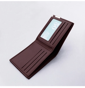 Detailed interior of dark brown bifold wallet showing card slots and ID window