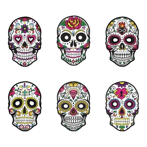 Set of six colorful Day of the Dead sugar skull masks with floral patterns and heart details