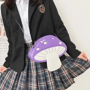 Cute mushroom-shaped crossbody bag in purple and white PU leather with silver chain strap