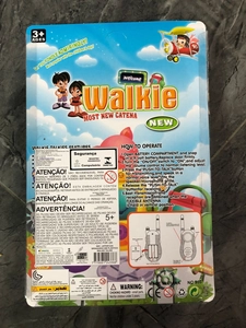 Detail of toy walkie talkie back packaging with usage instructions and safety certifications