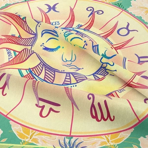 Close-up of fabric texture featuring Sun and Zodiac constellation tapestry prints