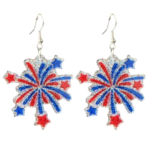 Detail of glittery Fourth of July firework drop earrings in red white and blue colors