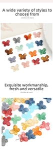 Close-up of colorful translucent gradient acrylic butterfly beads for DIY jewelry making