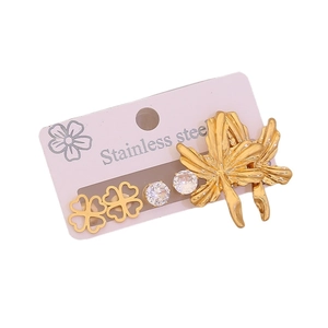 Three pairs of golden stainless steel stud earrings with leaf, clover, and zircon designs