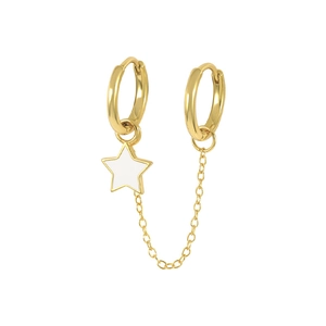Detailed view of gold chain earrings with a white enamel star charm and polished finish