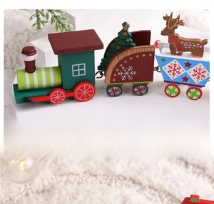 Detail of colorful wooden Christmas train toy with festive tree and reindeer figures