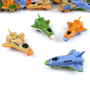 Detailed view of colorful plastic toy space shuttles with speed sky and space decals