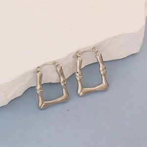Retro geometric bamboo-shaped stainless steel oval hoop earrings for women in silver color