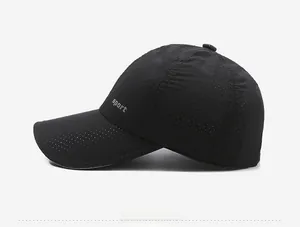 Close-up of breathable mesh fabric and sport lettering on black quick-dry baseball cap