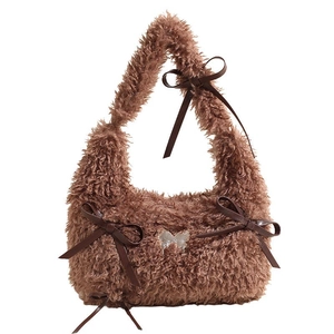 Brown fuzzy faux fur tote bag featuring stylish leather bows and a butterfly accent