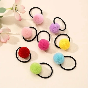 Set of 8 colorful plush ball hair ties in candy colors for children and girls