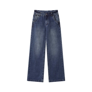 Detail of vintage low-waist washed straight leg jeans with deep blue denim texture