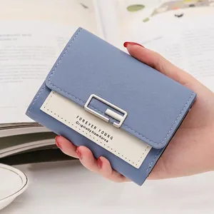 Mini multi-functional short wallet with blue and white leather patchwork and silver buckle