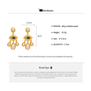 Spécifications des boucles d'oreilles vintage en forme d'œil avec perles et détails de taille