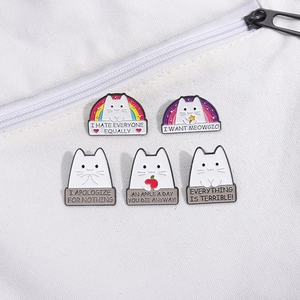 Set of five cute cartoon cat enamel pins with rainbow and star motifs for backpacks