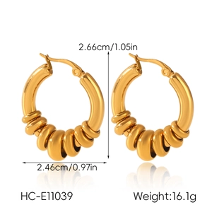 Detailed view of two-tone stainless steel earrings with precise size and weight dimensions