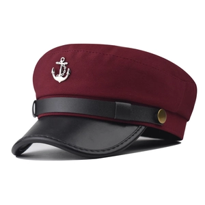 Classic burgundy sailor cap with black leather visor and silver anchor emblem