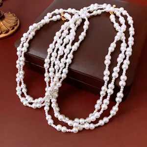 Vintage palace style multi-layer glass pearl necklace with gold clasp on leather box