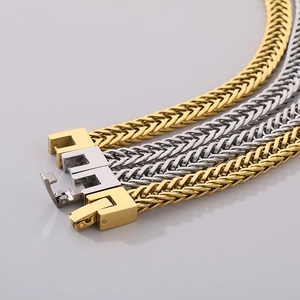 Detail of stainless steel wheat chains with secure square box clasps in gold and silver