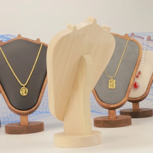 Rear view of light wood necklace display bust showing the sturdy round base and structure