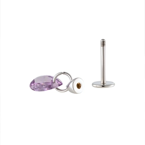 Silver barbell piercing with a vibrant purple heart-shaped zircon drop pendant